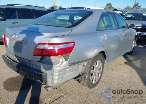 2007 Toyota Camry Xle z USA, uszkodzony, nr VIN 4T1BE46K77U084908